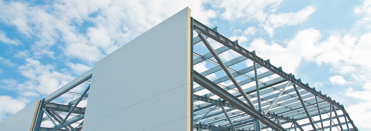 Commercial property under construction showing insulated sandwich panels.